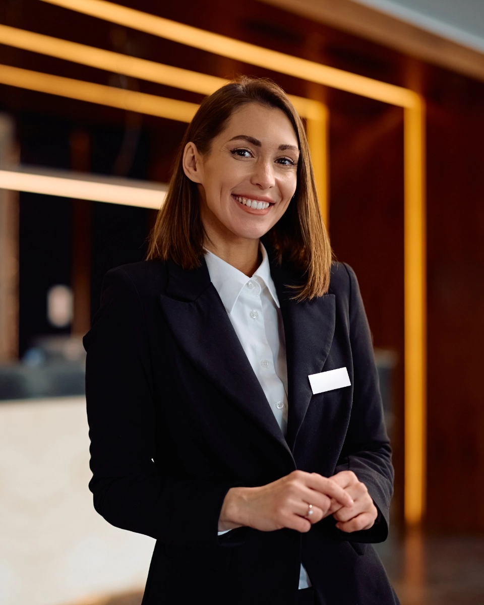 Hospitality graduate working at the front desk of a luxury US hotel after her LOORU placement